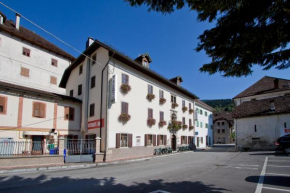 Гостиница Albergo Alle Alpi, Комельянс